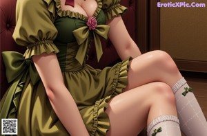 A woman in a green dress sitting on a bed.