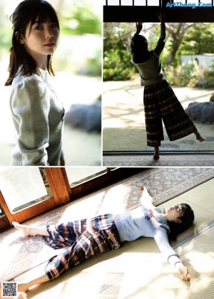 A woman in a red shirt laying on the floor.