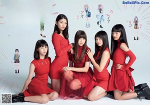 A group of girls in red dresses posing for a magazine.