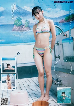 A woman in a white bathing suit holding a bucket of water.