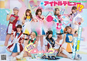 A group of young women dressed in colorful outfits posing for a picture.